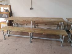 A pine and scaffold table and matching benches,
