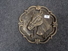 A cast iron horse head hook