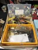 A crate containing a large quantity of fly making equipment