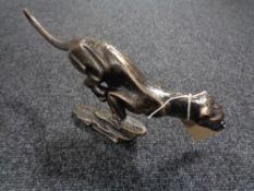 A cast iron cheetah figure