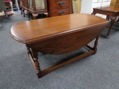 An Old Charm oak drop leaf coffee table