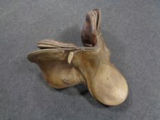 A brown leather saddle