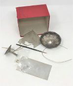 A small quantity of white metal (believed silver) from the workshop of a silversmith.