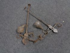 Two sets of vintage cast iron hanging scales
