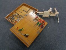 A mid 20th century wall mounted tool cabinet with key containing hand tools and a vintage metal