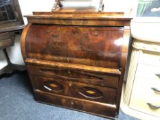 A 19th century barrel fronted bureau