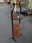 An inlaid mahogany three tier cake stand