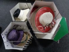 Four hat boxes containing lady's formal hats