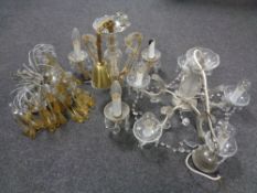 An early 20th century glass three branch chandelier with glass drops together with a further glass