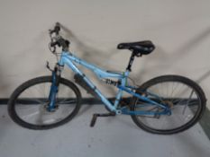 A girl's Apollo full suspension mountain bike