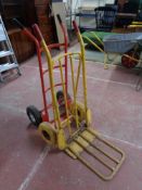 Two metal sack barrows