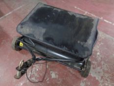 An Agri-Fab grass collector and a boxed tow tine dethatcher , for a ride-on mower.