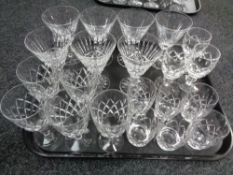 A tray of assorted lead crystal drinking glasses
