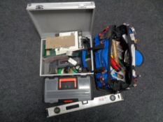 A tool bag aluminium case, box of hand tools, spirit levels,