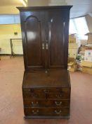 A George III oak bureau bookcase