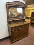 An Edwardian oak Art Nouveau mirror backed sideboard