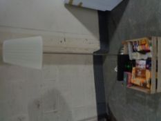 A contemporary standard lap with shade together with a box containing Yankee candles, gift sets,