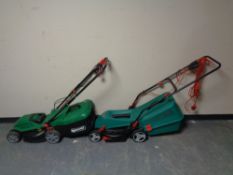 A Bosch Rotak 34R electric lawn mower with lead together with a Qualcast electric mower without