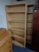 A pair of pine effect office bookshelves