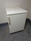 An AEG Santo under bench fridge, height 85 cm, width 55 cm, depth 60 cm.