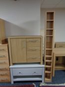 An oak effect low sideboard fitted cupboard,