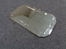 A 1930's un-framed mirror