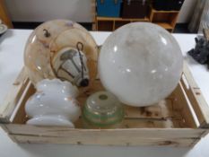 A crate of five vintage glass light shades