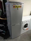 A Logik silver upright fridge freezer