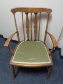 A beech spindle back armchair