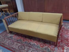 A 20th century mahogany framed day bed, height 76 cm, width 205 cm, depth 86 cm.