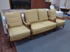 A contemporary three piece bergere suite
