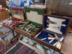 Three canteens of stainless steel cutlery, tea spoons,