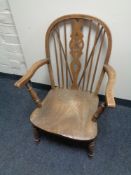 An em Windsor style kitchen armchair