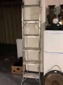 An aluminium three way ladder