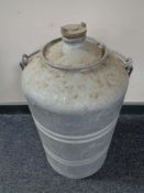 A 20th century galvanized canister with carry handle