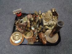 A tray of brass ornaments, trivets,