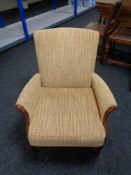 A mid 20th century fire side armchair