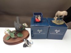 Four Border Fine Arts figures; blackbird on flowers on wooden stand (a/f), pony (boxed),