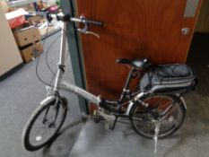 An Apollo Transition folding bicycle together with a Bike Hut bike bag