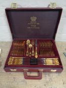 A set of West German Solingen gilded cutlery in fitted leather case