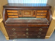 A 19th century mahogany barrel front writing bureau , height 109 cm, width 123 cm, depth 60 cm.
