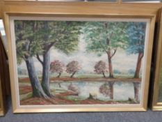 Continental school : Woodland by a lake, oil on canvas, framed.