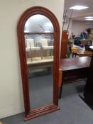 A late 19th century mahogany dome topped hall mirror