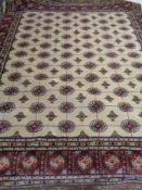 A cream ground Bokhara rug 240 cm x 160 cm