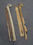 Three vintage three piece split cane fly rods in carry bags