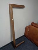 An Edwardian oak fire curb