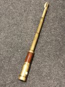 A brass and wood nautical telescope