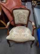 A French style salon armchair upholstered in a tapestry fabric