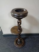 A stained beech barley twist smoker's stand