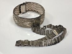 A silver fancy-link necklace,